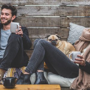 man, woman, dog, sofa (5688709)